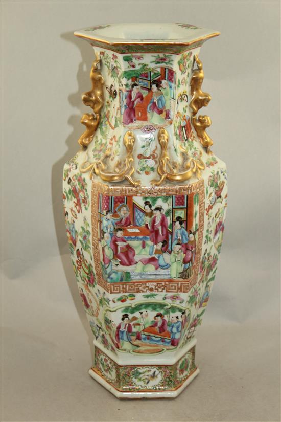 A Chinese Canton-decorated famille rose hexagonal baluster vase, mid 19th century, 44cm, slight restorations